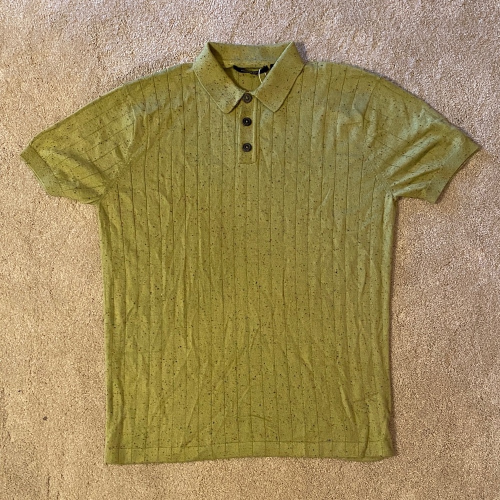 Propaganda agency green polo shirt